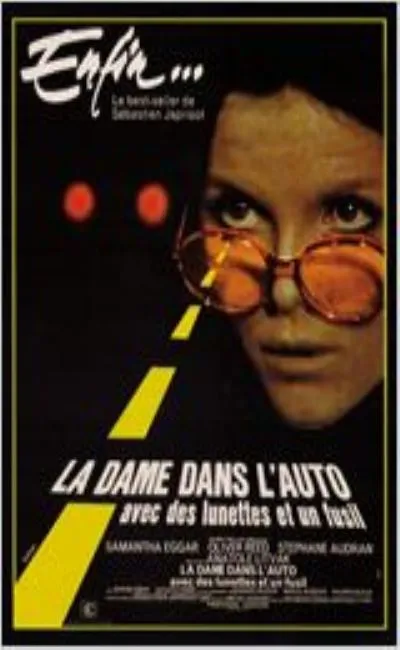 La dame dans l'auto avec des lunettes et un fusil (1970)